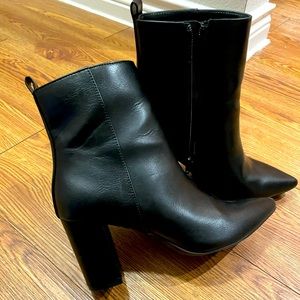 Black pointy toe boots from just fab.